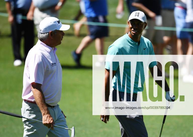 Fred Coupes walks with Tiger Woods after tee shots at practice on the Wednesday before the 2019 Masters Tournament at Augusta National Golf Club in Augusta, Georgia, on April 10, 2019. AUG20190410911 KEVINxDIETSCH