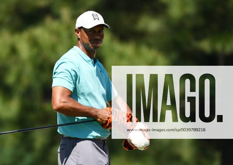 Tiger Woods takes off his head cover on the tee box on the Wednesday before the 2019 Masters Tournament at Augusta National Golf Club in Augusta, Georgia, on April 10, 2019. AUG20190410912 KEVINxDIETSCH
