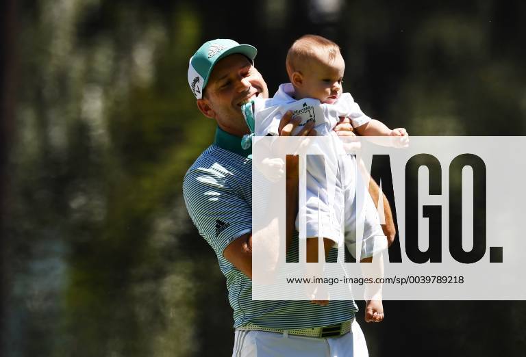 Sergio Garcia of Spain holds daughter Azalea Adele Garcia during the Par 3 Contest on the Wednesday before the 2019 Masters Tournament at Augusta National Golf Club in Augusta, Georgia, on April 10, 2019. AUG20190410916 KEVINxDIETSCH