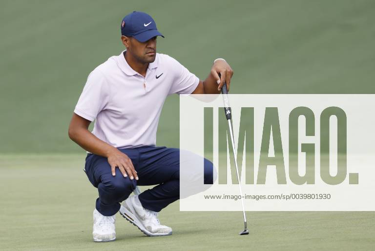 Tony Finau lines up a putt on the 2nd hole in the first round at the 2019 Masters Tournament at Augusta National Golf Club in Augusta, Georgia, on April 11, 2019. AUG20190411126 JOHNxANGELILLO