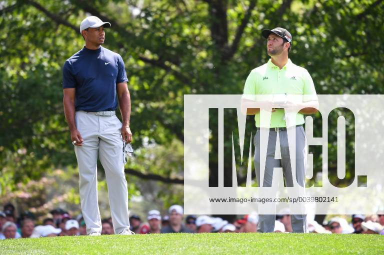 Tiger Woods (L) and Jon Rahm wait to hit off the 4th tee during the first round of the Masters Tournament at Augusta National Golf Club in Augusta, Georgia, on April 11, 2019. AUG20190411337 KEVINxDIETSCH