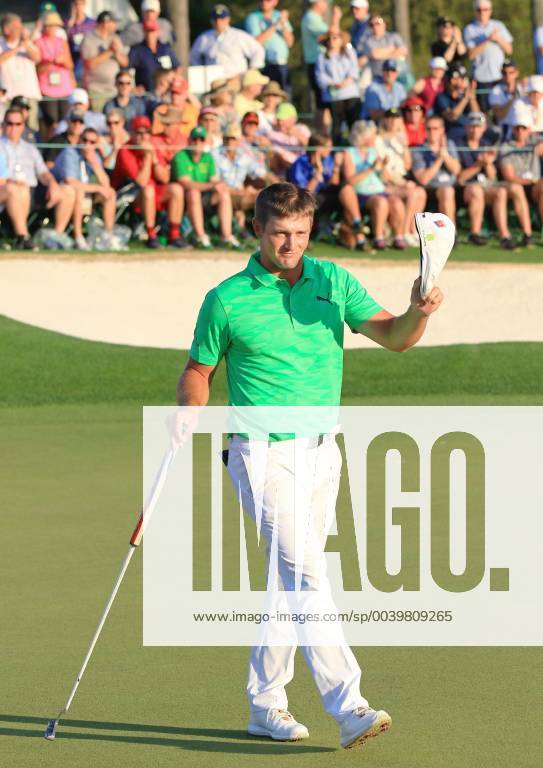 Golf: Masters Tournament Bryson DeChambeau of the United States acknowledges the gallery after making a birdie on the 18th hole during the first round of the Masters Tournament at Augusta National Golf Club in Augusta, Georgia, on April 11, 2019. DeChambeau and American compatriot Brooks Koepka shared the first-round lead.