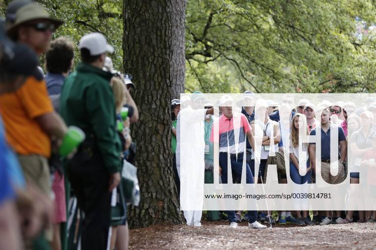 Jordan Spieth stands in the pine straw to play his 2nd shot on the first hole in the second round at the 2019 Masters Tournament at Augusta National Golf Club in Augusta, Georgia, on April 12, 2019. AUG20190412101 JOHNxANGELILLO