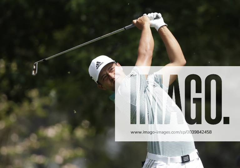 Xander Schauffele hits a tee shot on the 4th hole in the third round at the 2019 Masters Tournament at Augusta National Golf Club in Augusta, Georgia, on April 13, 2019. AUG20190413902 JOHNxANGELILLO