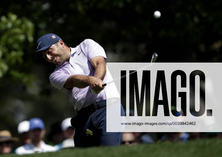 Francesco Molinari of Italy hits a tee shot on the 4th hole in the third round at the 2019 Masters Tournament at Augusta National Golf Club in Augusta, Georgia, on April 13, 2019. AUG20190413907 JOHNxANGELILLO