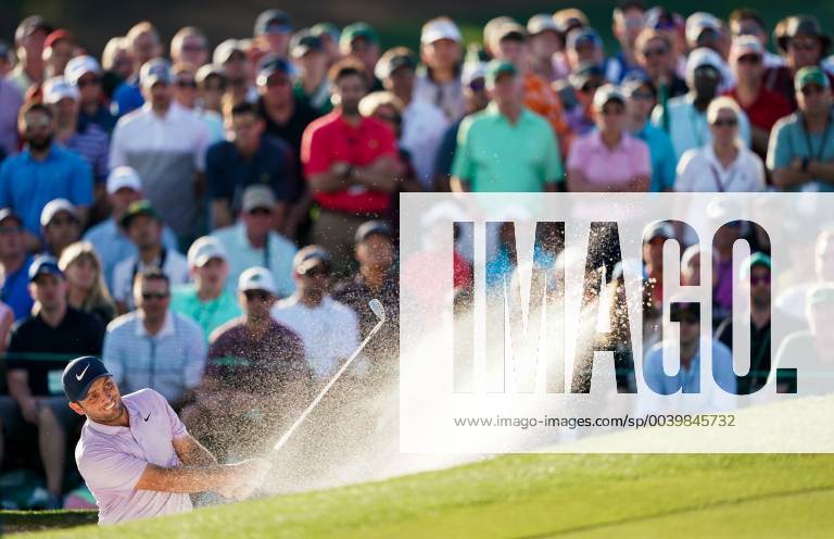 Francesco Molinari hits out of a bunker on the 18th fairway during the third round of the Masters Tournament at Augusta National Golf Club in Augusta, Georgia, on April 13, 2019. AUG201904133335 KEVINxDIETSCH