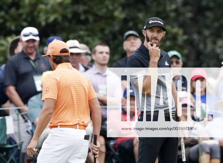 Dustin Johnson reacts after missing a putt for birdie on the 1st hole in the final round at the 2019 Masters Tournament at Augusta National Golf Club in Augusta, Georgia, on April 14, 2019. AUG20190414911 JOHNxANGELILLO