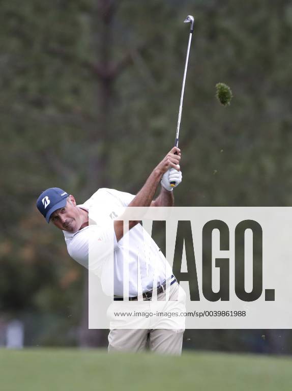 Matt Kuchar hits his approach shot on the 1st hole in the final round at the 2019 Masters Tournament at Augusta National Golf Club in Augusta, Georgia, on April 14, 2019. AUG20190414904 JOHNxANGELILLO