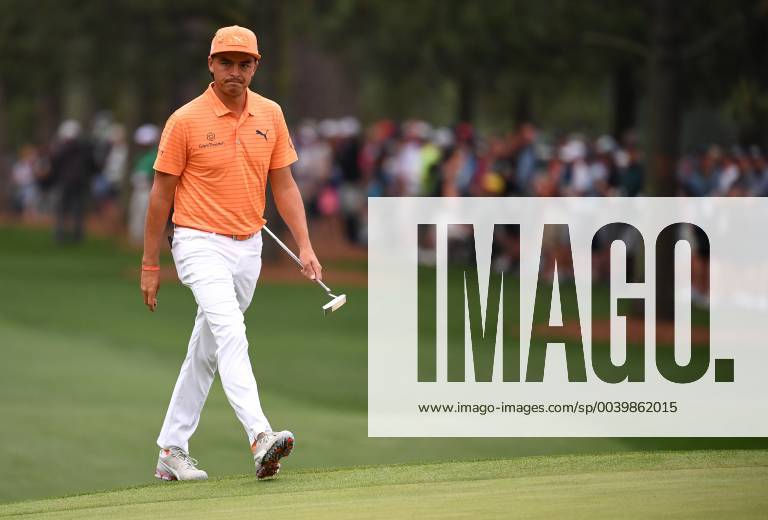Rickie Fowler walks on the first green during the final round of the Masters Tournament at Augusta National Golf Club in Augusta, Georgia, on April 14, 2019. AUG20190414301 KEVINxDIETSCH
