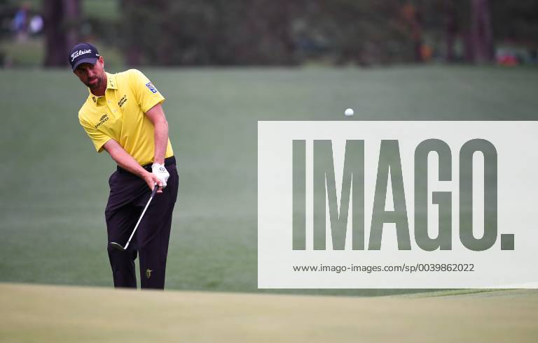 Webb Simpson chips on the first fairway during the final round of the Masters Tournament at Augusta National Golf Club in Augusta, Georgia, on April 14, 2019. AUG20190414308 KEVINxDIETSCH