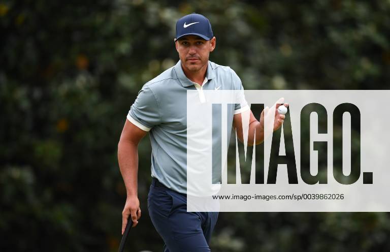 Brooks Koepka acknowledges the patrons after putting for parr on the first green during the final round of the Masters Tournament at Augusta National Golf Club in Augusta, Georgia, on April 14, 2019. AUG20190414312 KEVINxDIETSCH