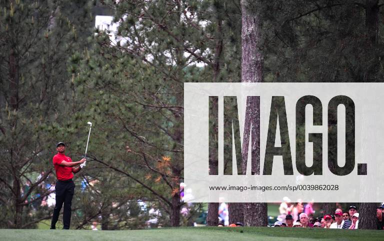 Tiger Woods hits on the first fairway during the final round of the Masters Tournament at Augusta National Golf Club in Augusta, Georgia, on April 14, 2019. AUG20190414314 KEVINxDIETSCH
