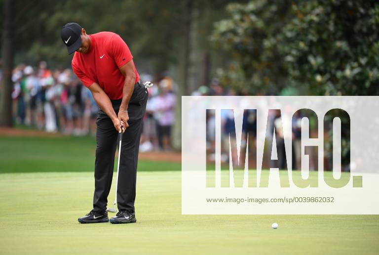 Tiger Woods putts on the first green during the final round of the Masters Tournament at Augusta National Golf Club in Augusta, Georgia, on April 14, 2019. AUG20190414318 KEVINxDIETSCH