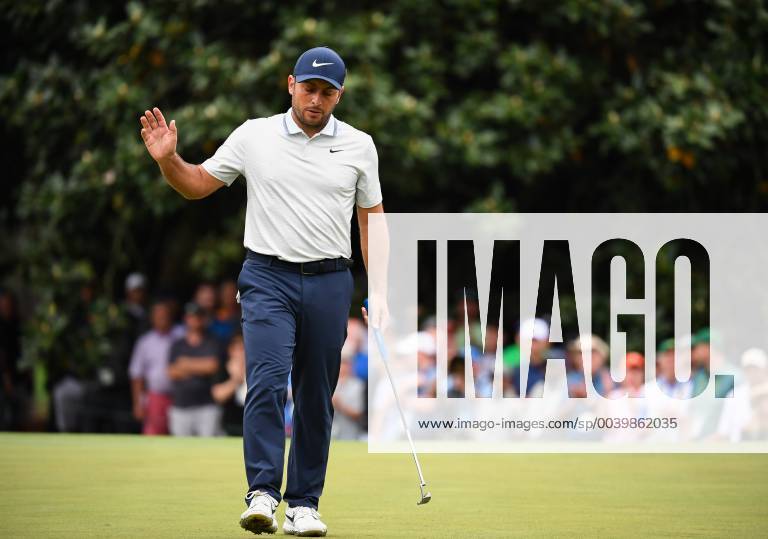 Francesco Molinari acknowledges the patrons after putting on the first green during the final round of the Masters Tournament at Augusta National Golf Club in Augusta, Georgia, on April 14, 2019. AUG20190414321 KEVINxDIETSCH