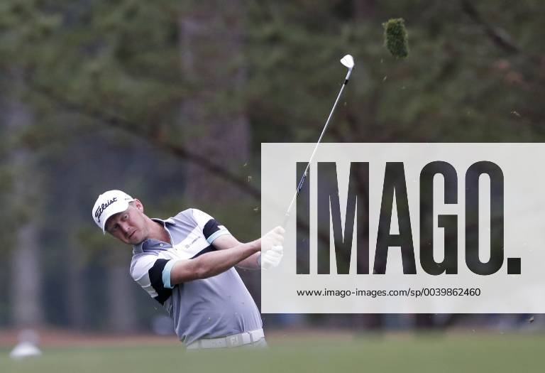 Justin Harding hits his approach shot on the 1st hole in the final round at the 2019 Masters Tournament at Augusta National Golf Club in Augusta, Georgia, on April 14, 2019. AUG20190414903 JOHNxANGELILLO