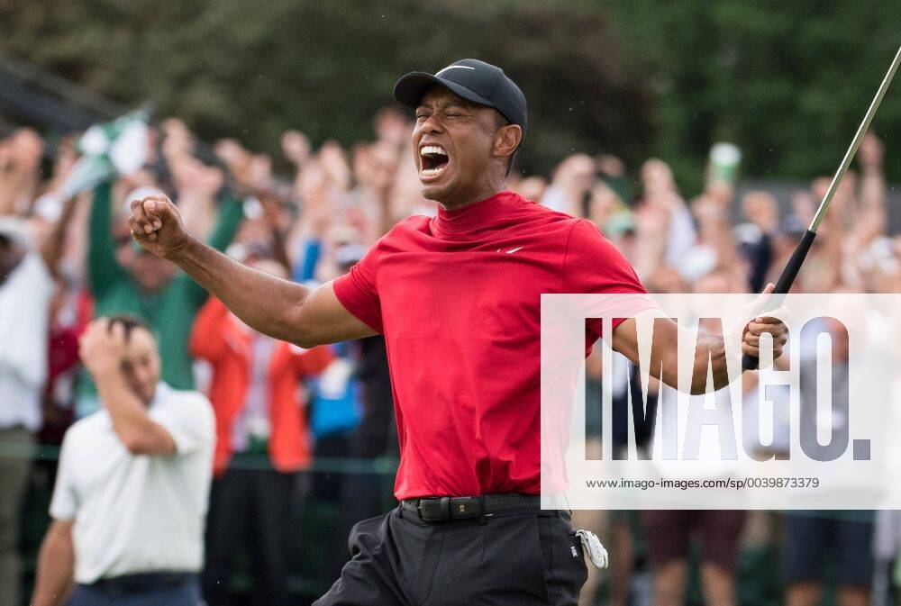 Tiger Woods celebrates after winning the 2019 Masters Tournament at Augusta National Golf Club in Augusta, Georgia, on April 14, 2019. Woods won the tournament 13-under-par. AUG20190414326 KEVINxDIETSCH