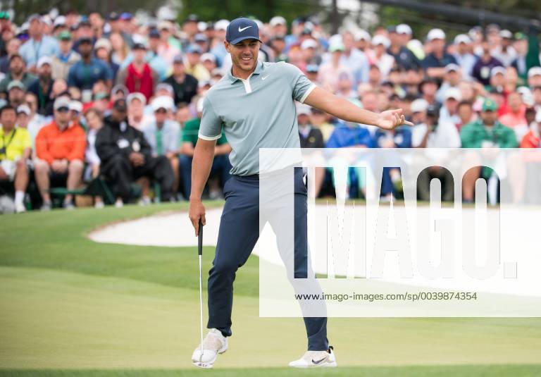 Brooks Koepka reacts to a missed putt on the 18th green during the final round of the Masters Tournament at Augusta National Golf Club in Augusta, Georgia, on April 14, 2019. AUG20190414352 KEVINxDIETSCH
