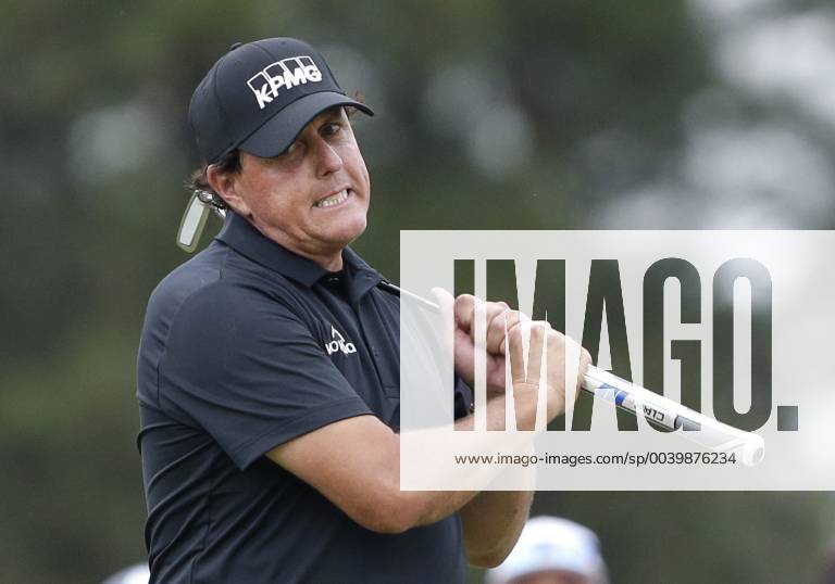 Phil Mickelson reacts after missing a birdie putt on the 9th green in the final round at the 2019 Masters Tournament at Augusta National Golf Club in Augusta, Georgia, on April 14, 2019. Tiger Woods wins the Masters with a score of 13 under par for his 5th Green Jacket. AUG20190414945 JOHNxANGELILLO