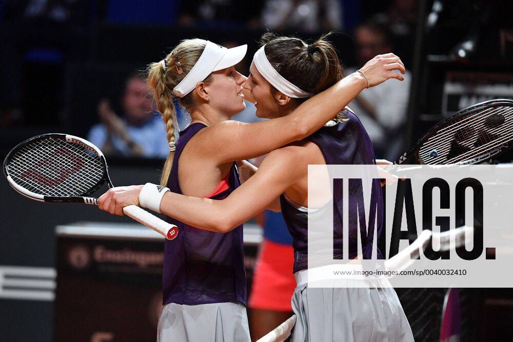 V li Angelique KERBER GER embraces the defeated Andrea PETKOVIC GER after her match ball Trost Aktion Tennis Porsche Tennis Grand Prix 2019 at the 25 04 2019 Porsche Arena in Stuttgart