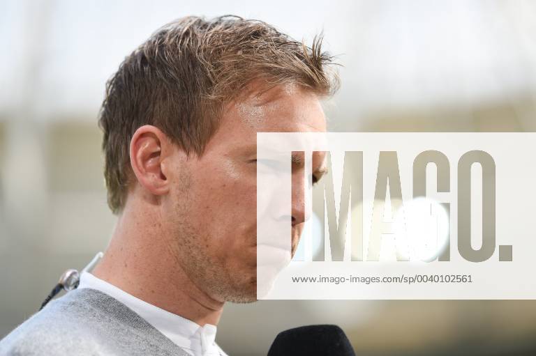 Soccer 1 Bundesliga TSG 1899 Hoffenheim VfL Wolfsburg v l Hoffenheims coach Julian Nagelsmann TSG 1899 Hoffenheim DFL regulations prohibit any use of photographs as image sequences and or quasi video 1 Fussball Bundesliga TSG 1899 Hoffenheim VfL Wolfsburg Sinsheim