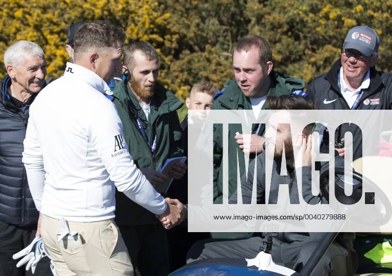 11th May 2019, Hillside Golf Club, Southport, England; Betfred British Masters, hosted by Tommy Fleetwood, day 3; Matt Wallace (ENG) shakes hands and apologies to a spectator who required first aid after he was hit on the back of the neck by Wallace s tee shot on the par four 15th hole ActionPlus12133758 DavidxBlunsden