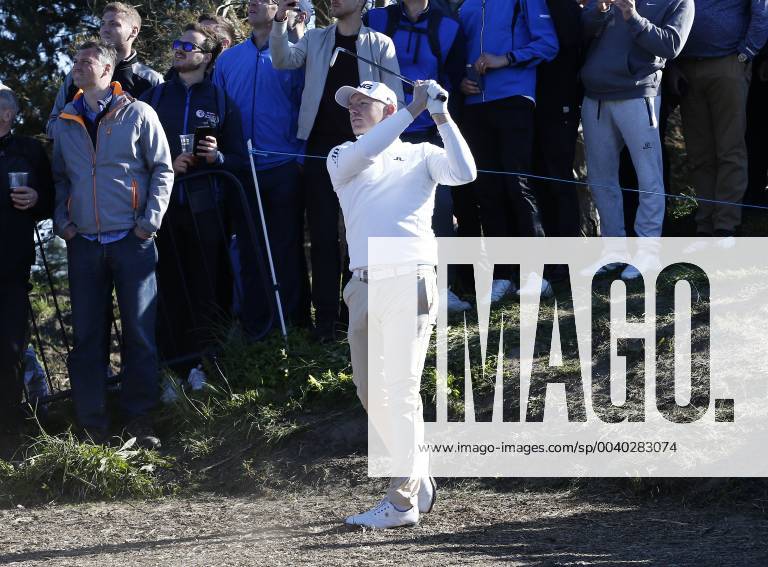 11th May 2019, Hillside Golf Club, Southport, England; Betfred British Masters, hosted by Tommy Fleetwood, day 3; Matt Wallace (ENG) plays his approach shot from the rough to the 18th green before finishing with a share of the overnight lead on 14 under par ActionPlus12133874 AlanxMartin