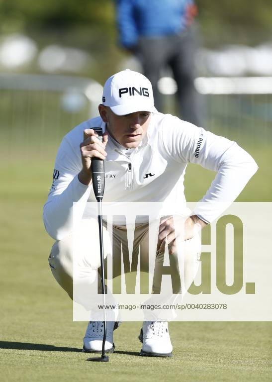 11th May 2019, Hillside Golf Club, Southport, England; Betfred British Masters, hosted by Tommy Fleetwood, day 3; Matt Wallace (ENG) lines up his putt on the 18th green before finishing with a share of the overnight lead on 14 under par ActionPlus12133878 AlanxMartin