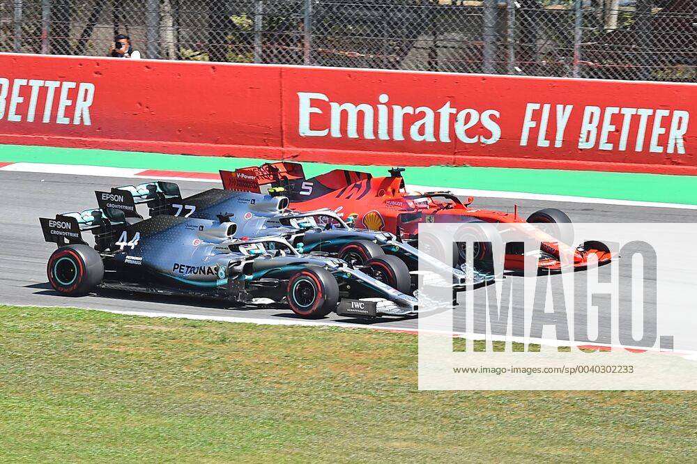 FIA Formula 1 Grand Prix of Spain 2019 race Start to the race Lewis Hamilton Mercedes AMG Petronas presses inside Valtteri Bottas Mercedes AMG Petronas middle and Sebastian Vettel Ferrari outside past Barcelona eel-fotografie Eberhard Krieger