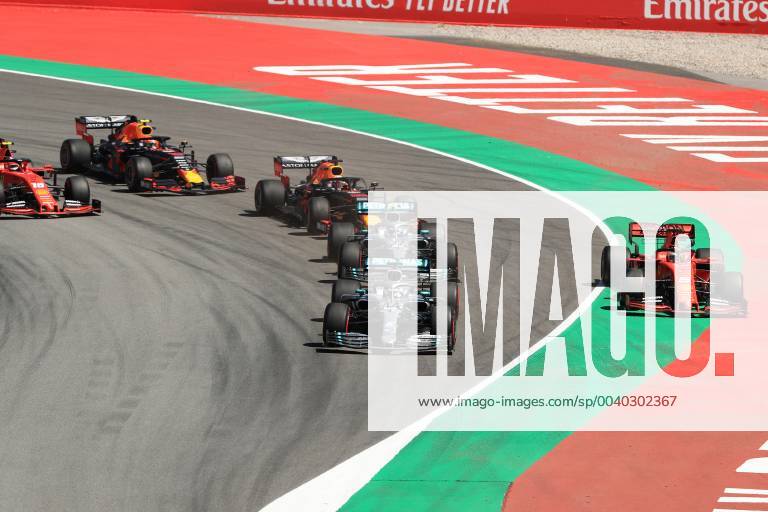 12th May 2019, Circuit de Barcelona-Catalunya, Barcelona, Spain; Formula One Grand Prix of Spain, race day; Mercedes AMG Petronas Motorsport, Lewis Hamilton, team mate Valtteri Bottas and Scuderia Ferrari, Sebastian Vettel battle through Turn 1 into turn 2 ActionPlus12134243 Octane