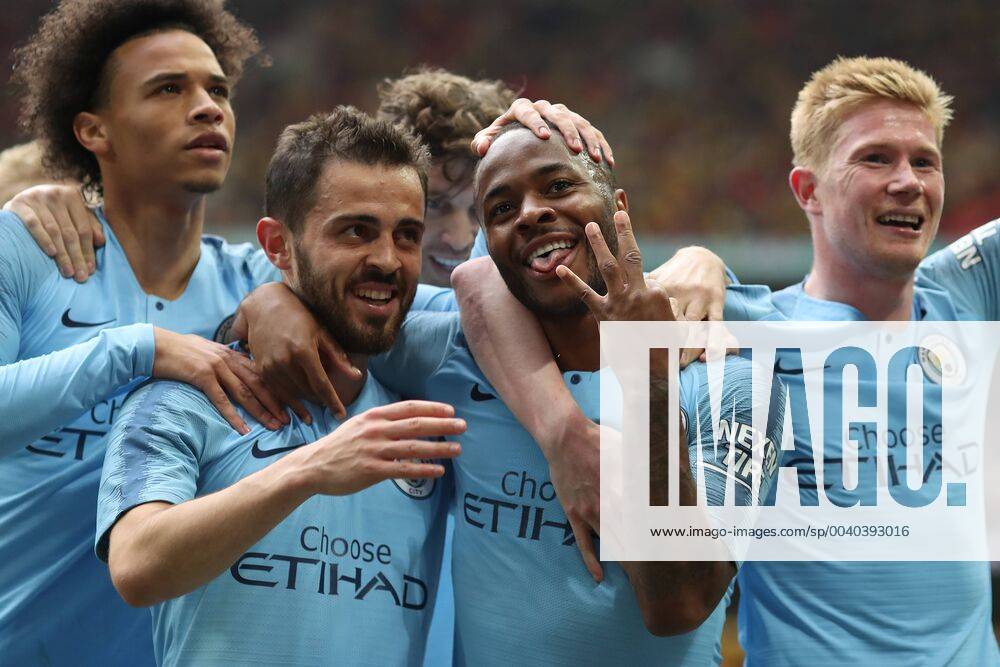 KW20 18th May 2019, Wembley Stadium, London England; Emirates FA Cup Final football, Manchester City versus Watford; Raheem Sterling of Manchester City celebrates with team mates indicating City have won the treble after he scores for 5-0 in the 81st minute ActionPlus12135780 ShaunxBrooks