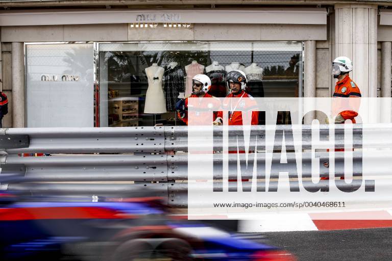 Motorsports: FIA Formula One World Championship, WM, Weltmeisterschaft 2019, Grand Prix of Monaco, Track marshals in front of a Miu Miu store Monte Carlo Monaco