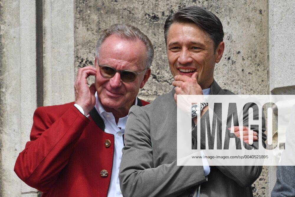 Niko KOVAC Coach Bayern Muenchen with Karl Heinz RUMMENIGGE, Chairman of the Board of FC Bayern Muenchen Master Celebration on the Town Hall Balcony Marienplatz in Muenchen on 26 05 2019 Football, Season 2018 19, DFB Cup Final RB Leipzig L FC Bayern Muenchen M 0 3