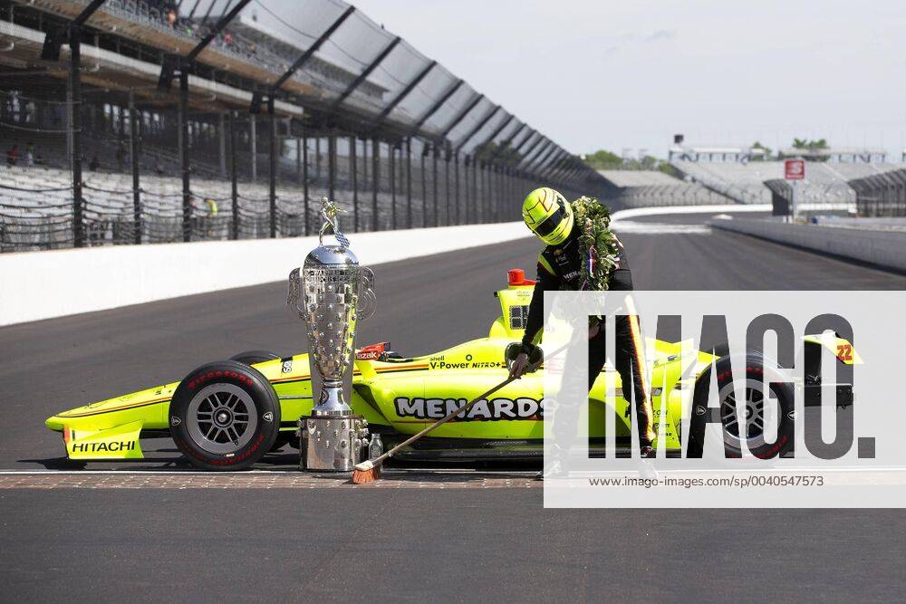 KW22 INDIANAPOLIS, IN - MAY 27: IndyCar, Indy Car, IRL, USA driver Simon Pagenaud (22) of the Menards Team Penske Chevrolet sweeps the yard of bricks after winning the Indy Grand Prix, the Pole for the Indy 500 and then winning the Indy 500 to complete the sweep during the Indianapolis 500 Winners photo shoot on May 27, 2019, in Indianapolis, IN.(Photo by Jeffrey Brown Icon Sportswire) AUTO: MAY 27 IndyCar Series - 103rd Indianapolis 500 Icon19052701500