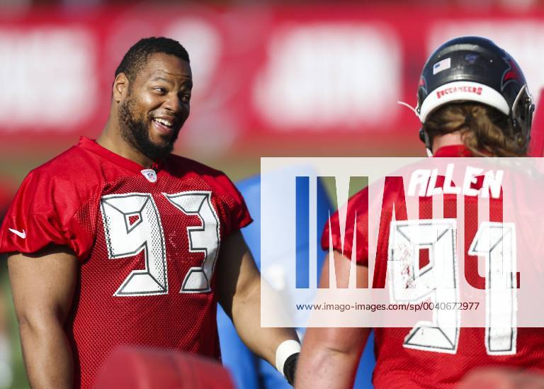 Tampa, Florida, U.S. - Tampa Bay Buccaneers nose tackle Ndamukong Suh (93) laughs while talking with defensive tackle Beau Allen (91) between drills while on the field during mandatory mini-camp on June 5, 2019 at the AdventHealth Training Center in Tampa, Florida. Tampa U.S. - ZUMAbad_ 20190605_mda_s70_225