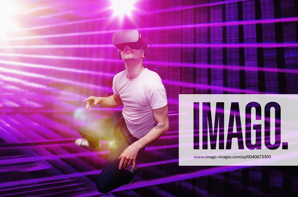 Young man using virtual reality simulator glasses Germany Berlin