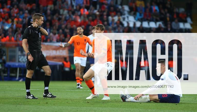 Netherlands v England UEFA Nations League Semi-Final Marten de Roon of Netherlands appeals to referee Clement Turpin after fouling Ross Barkley of England during the UEFA Nations League Semi-Final match at Estadio D. Afonso Henrique, Guimaraes Content Not Available For UK Newspapers