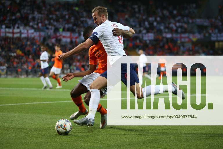 Netherlands v England UEFA Nations League Semi-Final Denzel Dumfries of Netherlands and Harry Kane of England battle for the ball during the UEFA Nations League Semi-Final match at Estadio D. Afonso Henrique, Guimaraes Content Not Available For UK Newspapers