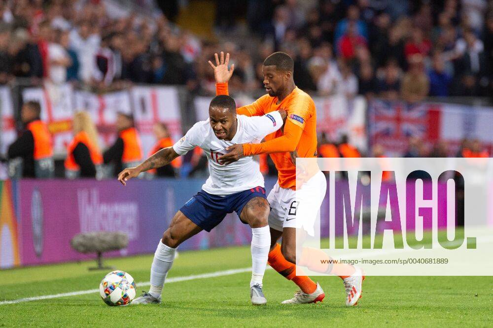 Guimares, Portugal - Raheem Sterling of England and Georginio Wijnaldum of the Netherlands during the UEFA Nations League match between Netherlands and England at Estadio D. Afonso Henriques, GuimaroÂ£es, Portugal on Thursday 6th June 2019. Netherlands v England - UEFA Nations League Semi-Final - ZUMAn230 20190606_zaa_n230_674