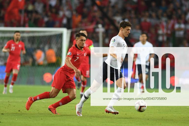 Frances Benjamin Pavard and Turkeys Cengiz Under during Euro 2020 group H qualifying soccer match between Turkey and France at the Konya City Stadium in Konya, Turkey