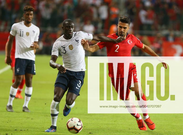 Zeki Celik (R) of Turkey and Ferland Mendy of France during the Euro 2020 football qualification match between Turkey and France at the Buyuksehir Belediyesi stadium in Konya, on June 8, 2019.