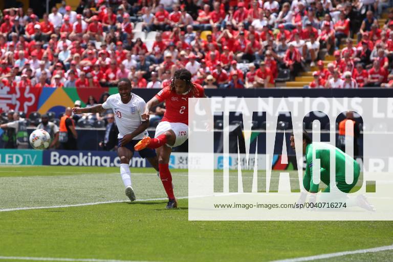 Switzerland v England UEFA Nations League 3rd Place Play-off Kevin Mbabu of Switzerland clears the ball ahead of Raheem Sterling of England during the UEFA Nations League 3rd Place Play-off match at Estadio D. Afonso Henrique, Guimaraes Content Not Available For UK Newspapers