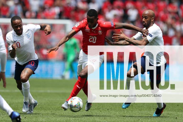 Guimaraes, Portugal - Switzerland s midfielder Edi Fernandes (C ) vies with Raheem Sterling of England (L) and Fabian Delph of England (R ) during the UEFA Nations League Third-place football match between Switzerland and England, at the Dom Afonso Henriques stadium in Guimaraes, Portugal, on June 9, 2019. Switzerland vs England - UEFA Nations League Third-place match - ZUMAn230 20190609_zaa_n230_064