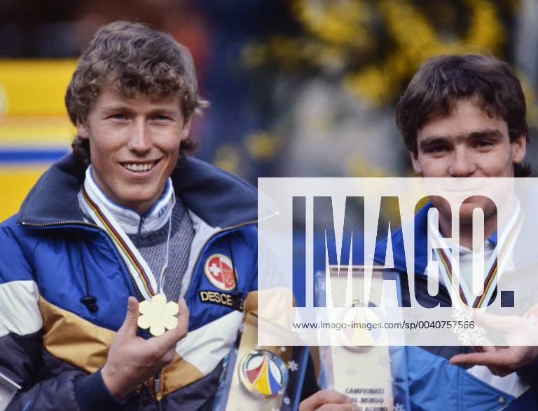 Ski WM 1985, combination men Pirmin ZURBRIGGEN, Thomas BURGLER SUI SKI ALPIN SAISON 84 85 WM 1985 Bormio combination men 05 02 1985 Pirmin ZURBRIGGEN li and Thomas BURGLER right both SUI present their medals Bormio Italy