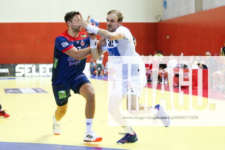 HANDBALL - EHF EC, AUT vs NOR KLAGENFURT,AUSTRIA,13.JUN.19 - HANDBALL - EHF EURO Cup, international match, Länderspiel, Nationalmannschaft Austria vs Norway. Image shows Harald Reinkind (NOR) and Gerald Zeiner (AUT). GEPAxpictures xDanielxGoetzhaber