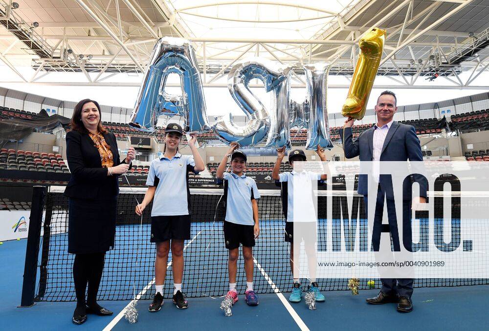 KW26 TENNIS AUSTRALIA ASH BARTY REAX, Queensland Premier Annastacia Palaszczuk (left) and the President of Tennis Queensland Mark Bloomfield join young tennis players in celebrating Ash Barty s new world number one ranking at the Pat Rafter Arena in Brisbane, Monday, June 24, 2019. Barty was elevated to the top spot after winning the Birmingham Classic in the UK. ( NO ARCHIVING, , NO USE IN BOOKS WITHOUT CONSENT BRISBANE QLD AUSTRALIA