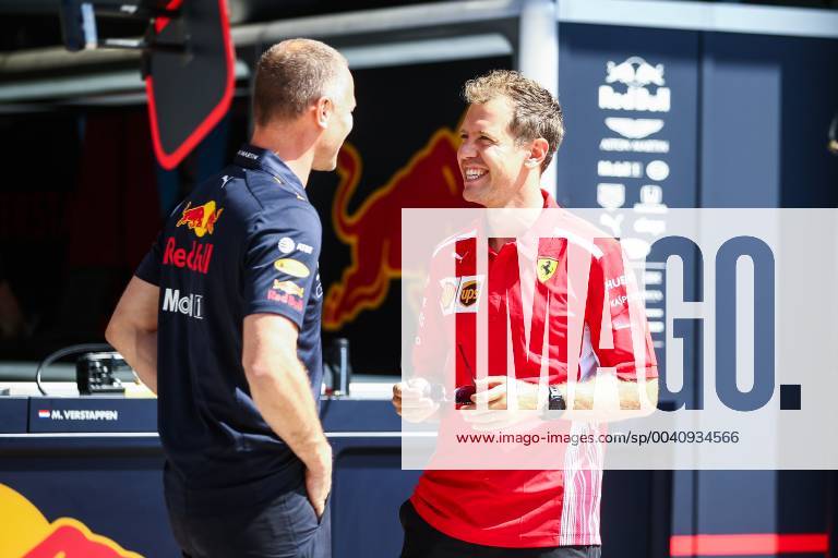 FORMULA 1 - GP of Austria 2019 SPIELBERG,AUSTRIA,27.JUN.19 - MOTORSPORTS, FORMULA 1 - Grand Prix of Austria, Red Bull Ring, preview. Image shows Sebastian Vettel (GER Ferrari) and an engineer. GEPAxpictures xDanielxGoetzhaber