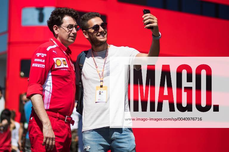 FORMULA 1 - GP of Austria 2019 SPIELBERG,AUSTRIA,30.JUN.19 - MOTORSPORTS, FORMULA 1 - Grand Prix of Austria, Red Bull Ring. Image shows executive director Mattia Binotto (Ferrari) and a fan. GEPAxpictures xDanielxGoetzhaber