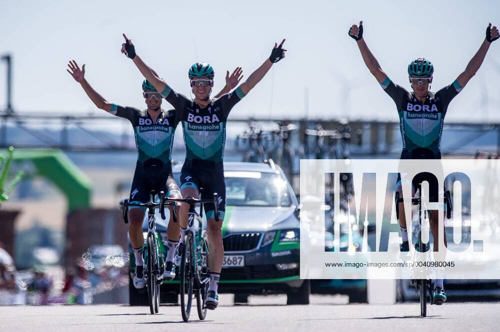 Maximilian Schachmann GER BORA hansgrohe becomes new German Champion in Road Cycling 2019 on the Sachsenring second Marcus Burghardt GER BORA hansgrohe and third Andreas Schillinger GER BORA hansgrohe finish finish arrival finish action action racing scene landscape horizontal event event German Championships road race elite men Sachsenring after to Sachsenring 181 1 km place location Sachsenring region Saxony Land Country Germany Date Date 30 06 2019 Stiehl Photography