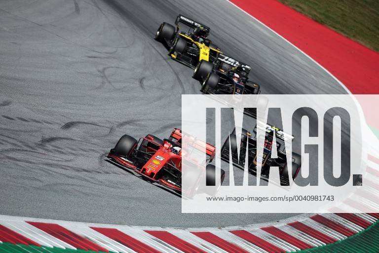 Photo4 LaPresse 30 06 2019 Spielberg, Austria Grand Prix Formula One Austria 2019 In the pic: Sebastian Vettel (GER) Scuderia Ferrari SF90 , Kevin Magnussen (DEN) Haas F1 Team VF-19, Romain Grosjean (FRA) Haas F1 Team VF-18