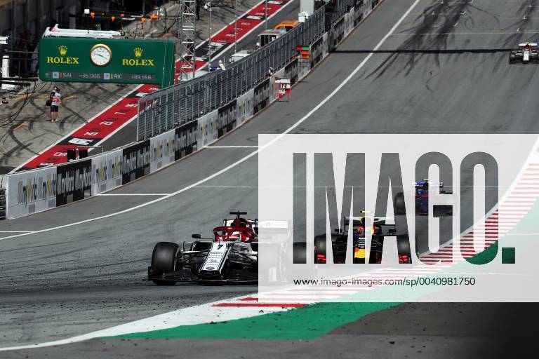 Photo4 LaPresse 30 06 2019 Spielberg, Austria Grand Prix Formula One Austria 2019 In the pic: Kimi Raikkonen (FIN) Alfa Romeo Racing C38, Pierre Gasly (FRA) Red Bull Racing RB15